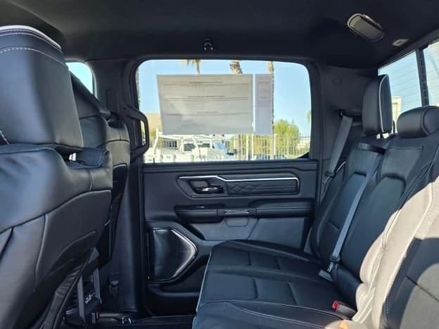 Ram 1500 Limited 4x4 Crew Cab 5'7" Box 2026 — side view