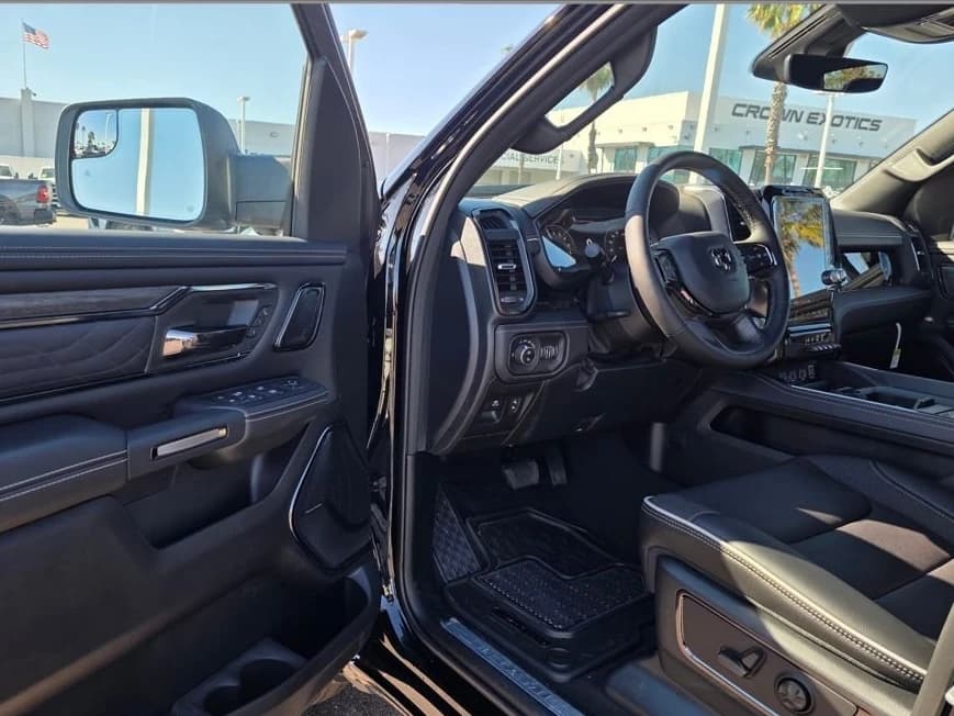 Ram 1500 Limited 4x4 Crew Cab 5'7" Box 2026 — side view