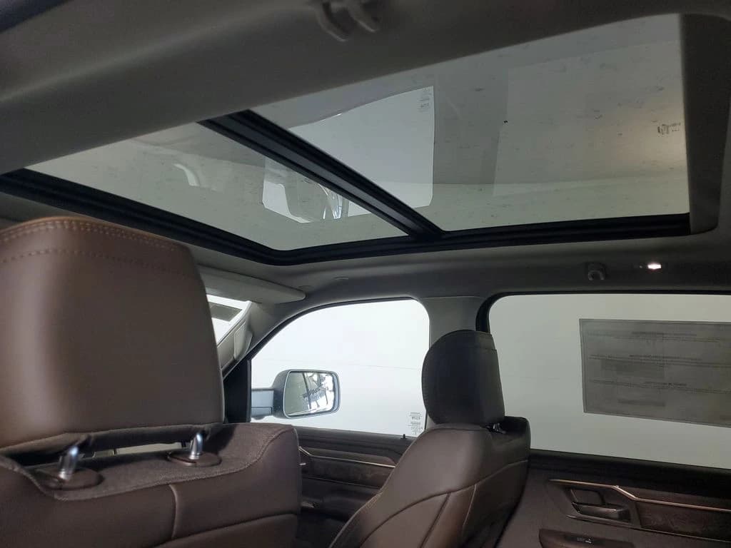Ram 1500 Longhorn 4x4 Crew Cab 5'7" Box 2026 — side view