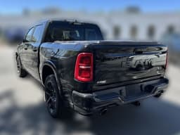 Ram 1500 Limited 4x4 Crew Cab 5'7" Box 2026 — side view