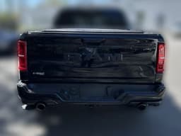 Ram 1500 Limited 4x4 Crew Cab 5'7" Box 2026 — side view