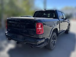 Ram 1500 Limited 4x4 Crew Cab 5'7" Box 2026 — side view