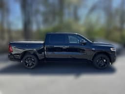 Ram 1500 Limited 4x4 Crew Cab 5'7" Box 2026 — side view