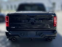 Ram 1500 Limited 4x4 Crew Cab 5'7" Box 2026 — side view