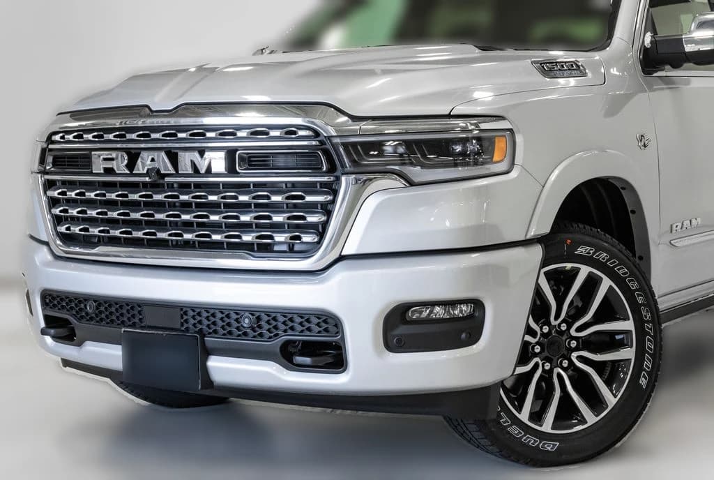 Ram 1500 Limited 4x4 Crew Cab 5'7" Box 2026 — side view