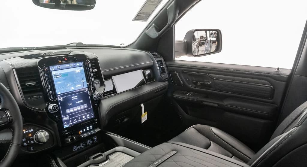 Ram 1500 Limited 4x4 Crew Cab 5'7" Box 2026 — side view