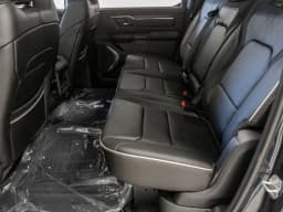 Ram 1500 Limited 4x4 Crew Cab 5'7" Box 2026 — side view