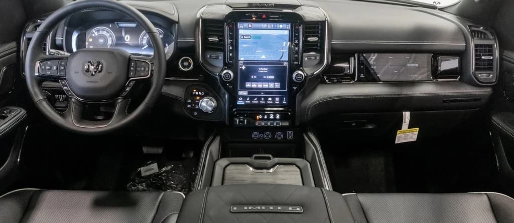 Ram 1500 Limited 4x4 Crew Cab 5'7" Box 2026 — side view