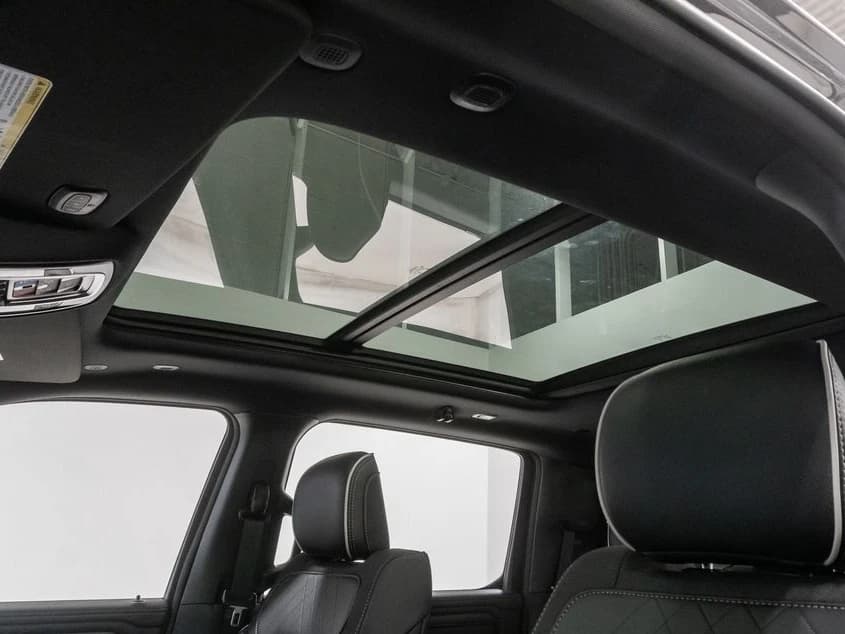 Ram 1500 Limited 4x4 Crew Cab 5'7" Box 2026 — side view