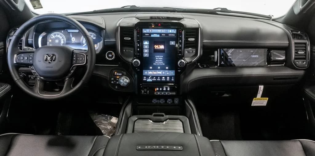 Ram 1500 Limited 4x4 Crew Cab 5'7" Box 2026 — side view