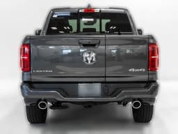Ram 1500 Limited 4x4 Crew Cab 5'7" Box 2026 — side view