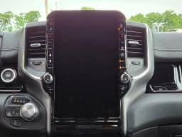 Ram 1500 Laramie 4x4 Crew Cab 5'7" Box 2026 — side view
