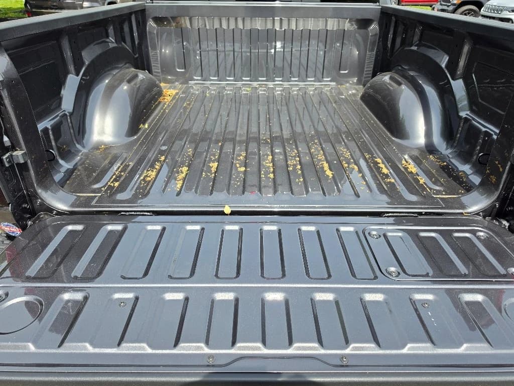 Ram 1500 Laramie 4x4 Crew Cab 5'7" Box 2026 — side view