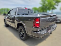 Ram 1500 Laramie 4x4 Crew Cab 5'7" Box 2026 — side view