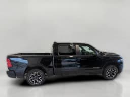 Ram 1500 Laramie 4x4 Crew Cab 5'7" Box 2026 — side view