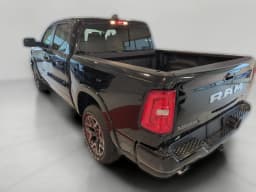 Ram 1500 Laramie 4x4 Crew Cab 5'7" Box 2026 — side view