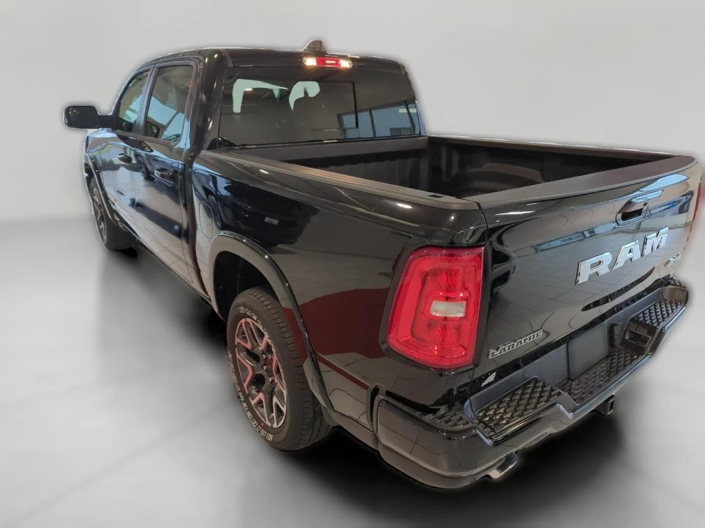 Ram 1500 Laramie 4x4 Crew Cab 5'7" Box 2026 — side view