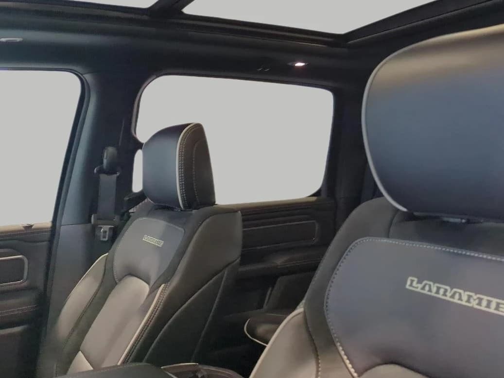 Ram 1500 Laramie 4x4 Crew Cab 5'7" Box 2026 — side view