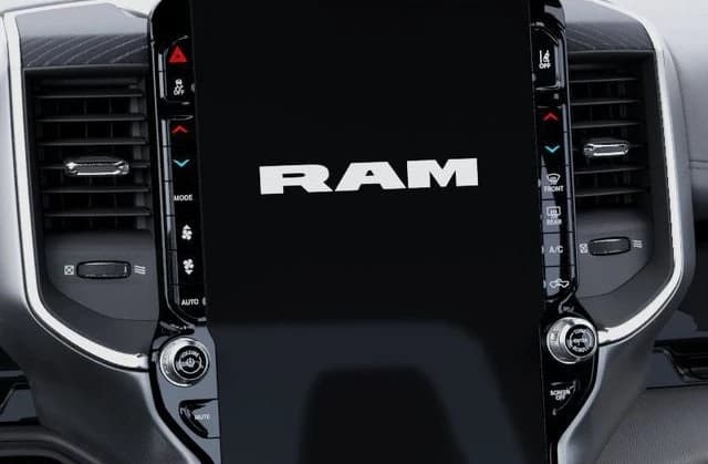 Ram 1500 Laramie 4x4 Crew Cab 5'7" Box 2026 — side view