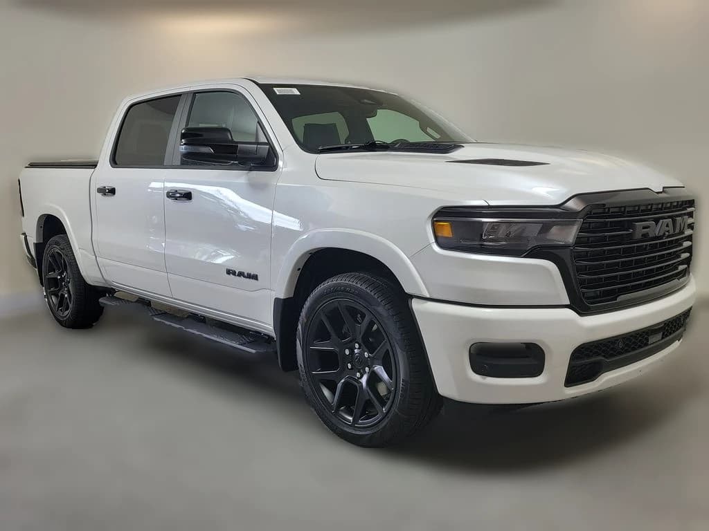Ram 1500 Laramie 4x4 Crew Cab 5'7" Box 2026 — side view