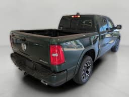 Ram 1500 Laramie 4x4 Crew Cab 5'7" Box 2026 — side view