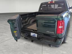Ram 1500 Laramie 4x4 Crew Cab 5'7" Box 2026 — side view