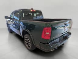 Ram 1500 Laramie 4x4 Crew Cab 5'7" Box 2026 — side view