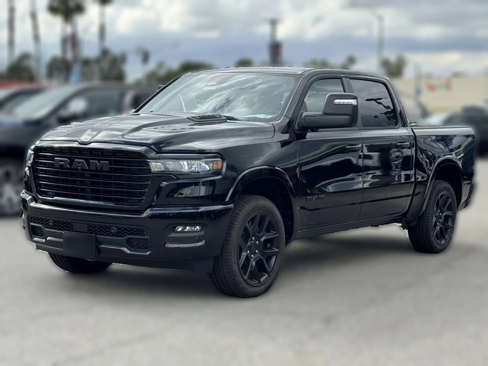 Ram 1500 Laramie 4x4 Crew Cab 5'7" Box 2026 — side view