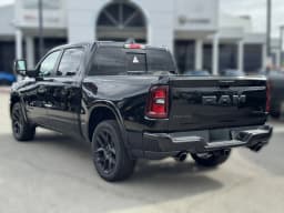 Ram 1500 Laramie 4x4 Crew Cab 5'7" Box 2026 — side view