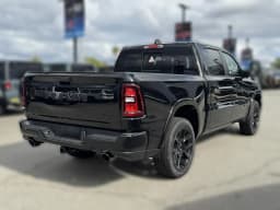 Ram 1500 Laramie 4x4 Crew Cab 5'7" Box 2026 — side view