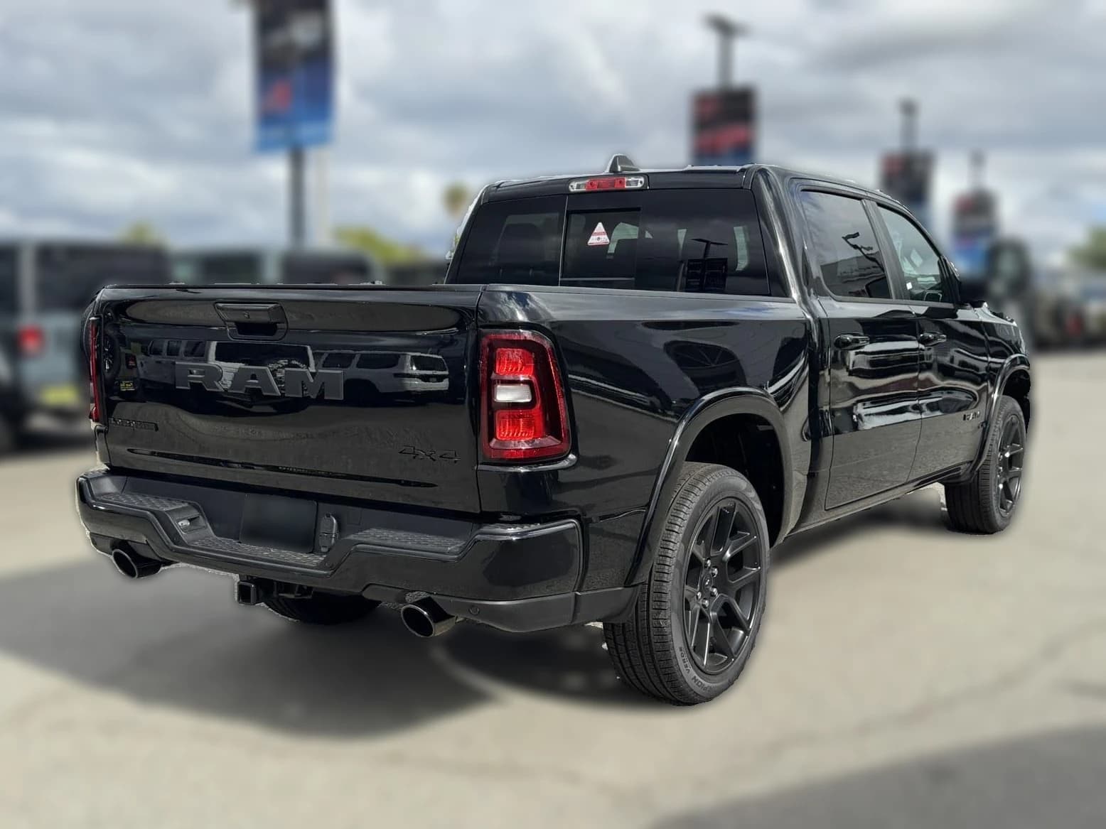Ram 1500 Laramie 4x4 Crew Cab 5'7" Box 2026 — side view
