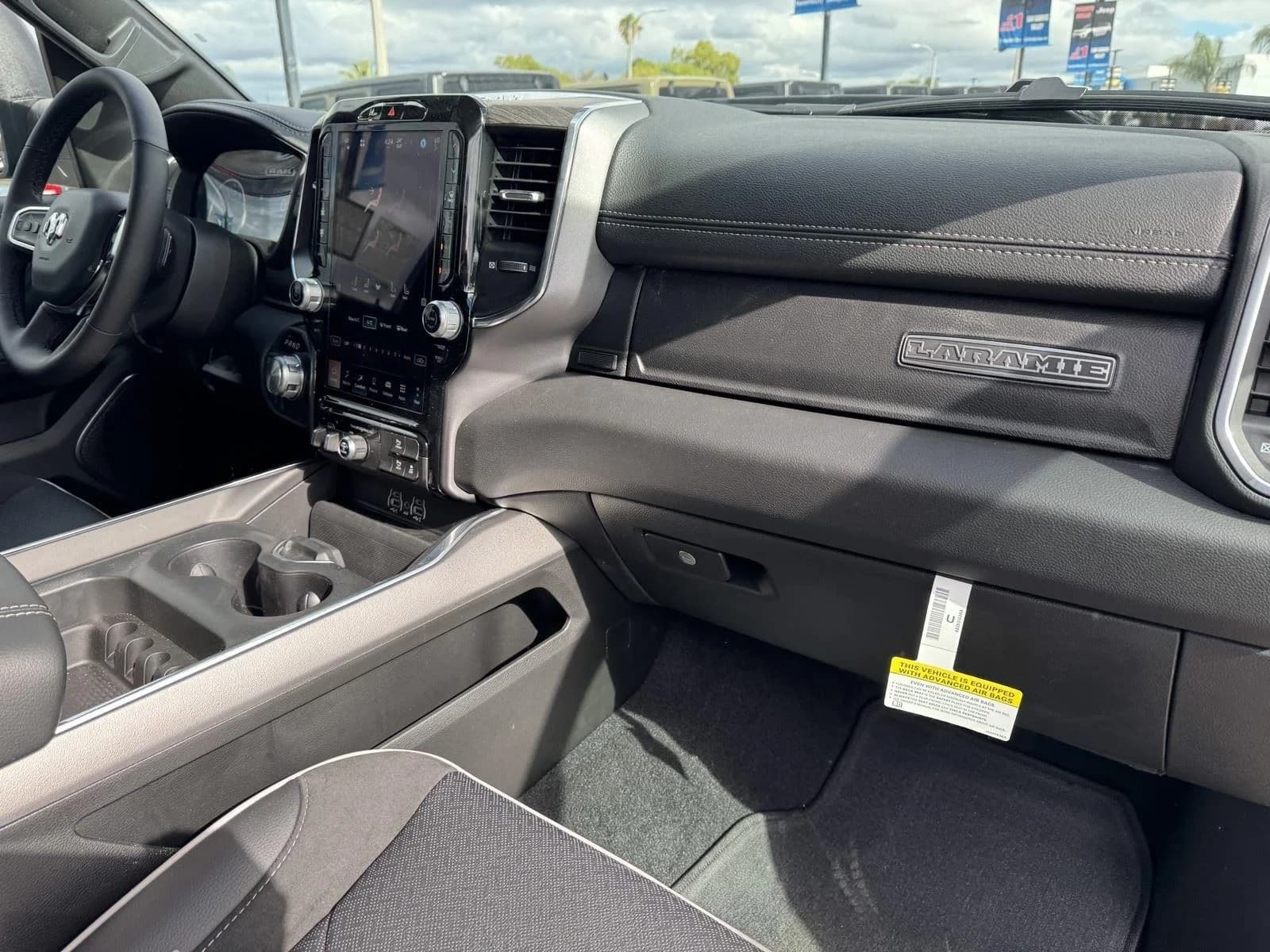 Ram 1500 Laramie 4x4 Crew Cab 5'7" Box 2026 — side view
