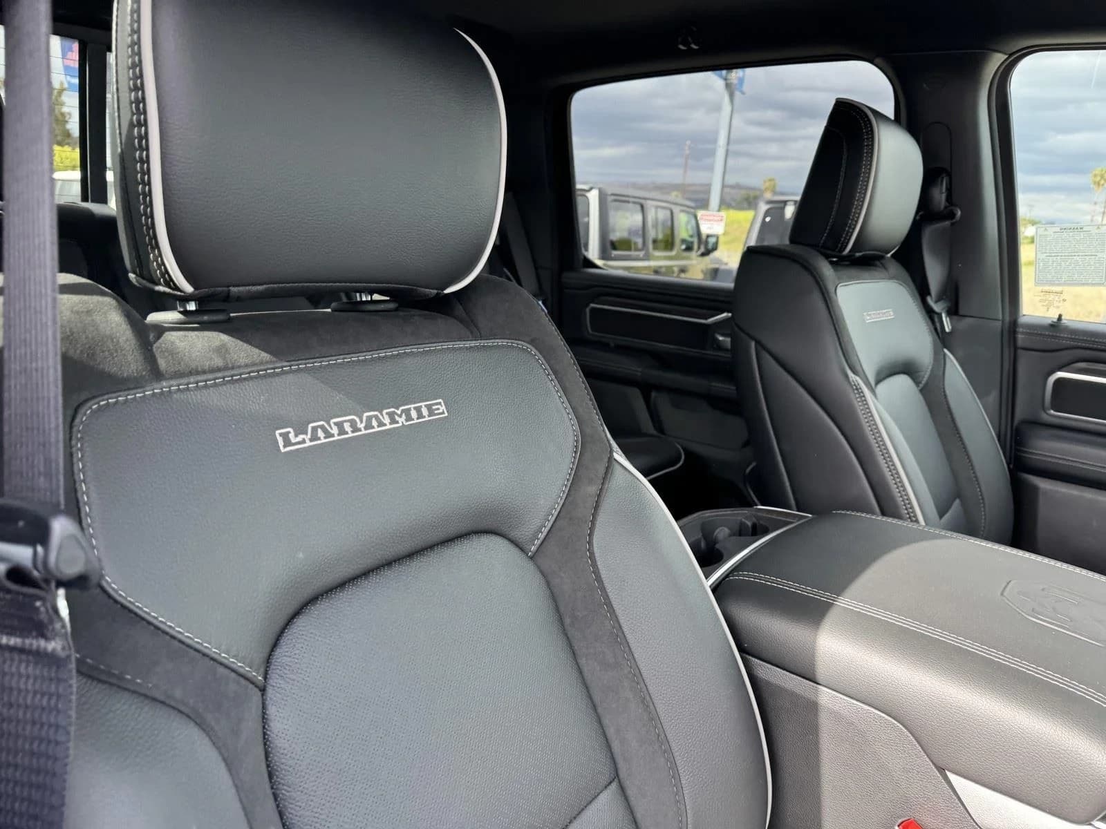 Ram 1500 Laramie 4x4 Crew Cab 5'7" Box 2026 — side view