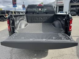 Ram 1500 Laramie 4x4 Crew Cab 5'7" Box 2026 — side view