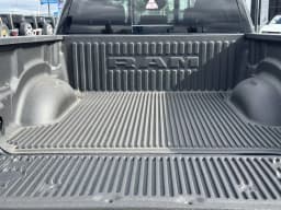 Ram 1500 Laramie 4x4 Crew Cab 5'7" Box 2026 — side view