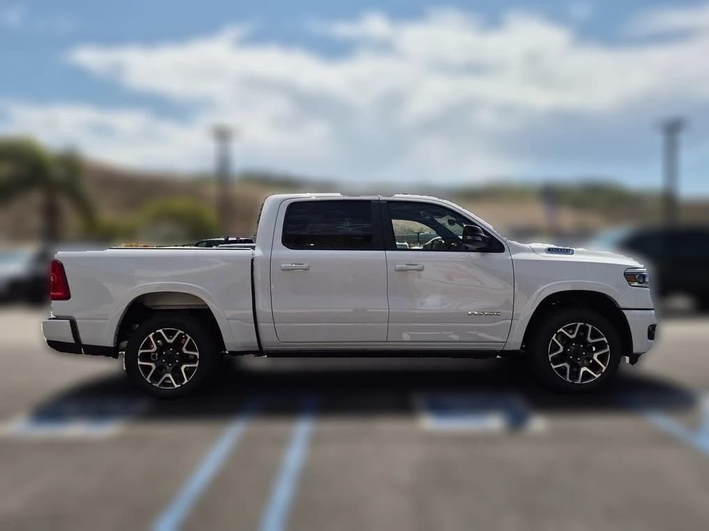 Ram 1500 Laramie 4x4 Crew Cab 5'7" Box 2026 — side view