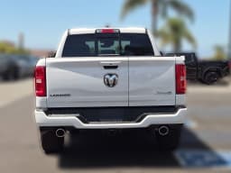 Ram 1500 Laramie 4x4 Crew Cab 5'7" Box 2026 — side view