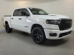 Ram 1500 Laramie 4x4 Crew Cab 5'7" Box 2026 — side view