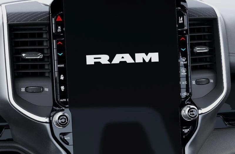 Ram 1500 Laramie 4x4 Crew Cab 5'7" Box 2026 — side view