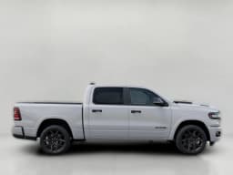 Ram 1500 Laramie 4x4 Crew Cab 5'7" Box 2026 — side view