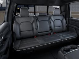 Ram 1500 Laramie 4x4 Crew Cab 5'7" Box 2026 — side view