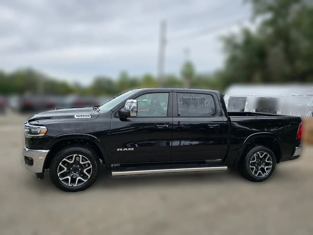 Ram 1500 Laramie 4x4 Crew Cab 5'7" Box 2026 — side view