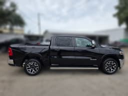 Ram 1500 Laramie 4x4 Crew Cab 5'7" Box 2026 — side view