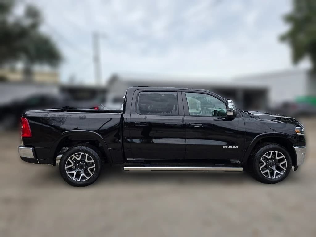 Ram 1500 Laramie 4x4 Crew Cab 5'7" Box 2026 — side view