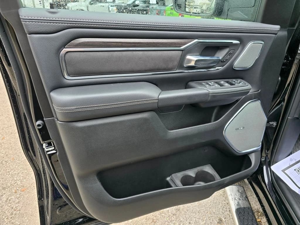 Ram 1500 Laramie 4x4 Crew Cab 5'7" Box 2026 — side view