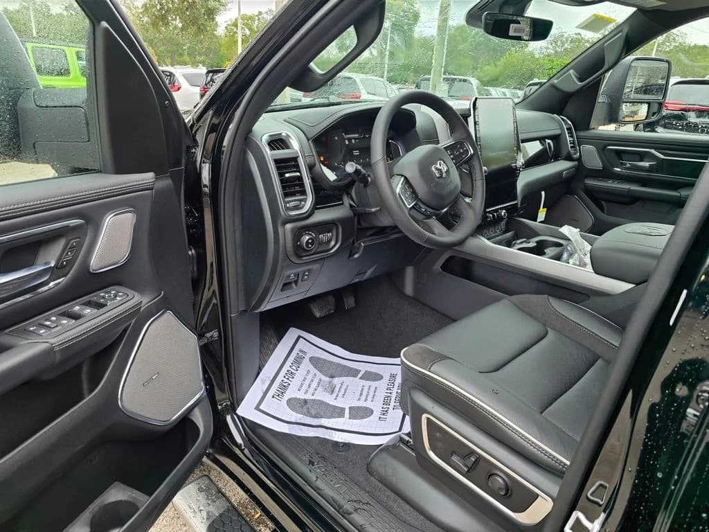 Ram 1500 Laramie 4x4 Crew Cab 5'7" Box 2026 — side view