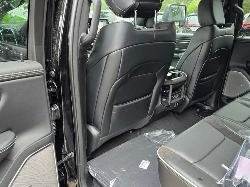 Ram 1500 Laramie 4x4 Crew Cab 5'7" Box 2026 — side view
