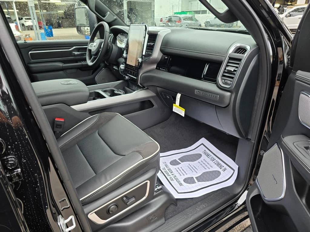 Ram 1500 Laramie 4x4 Crew Cab 5'7" Box 2026 — side view