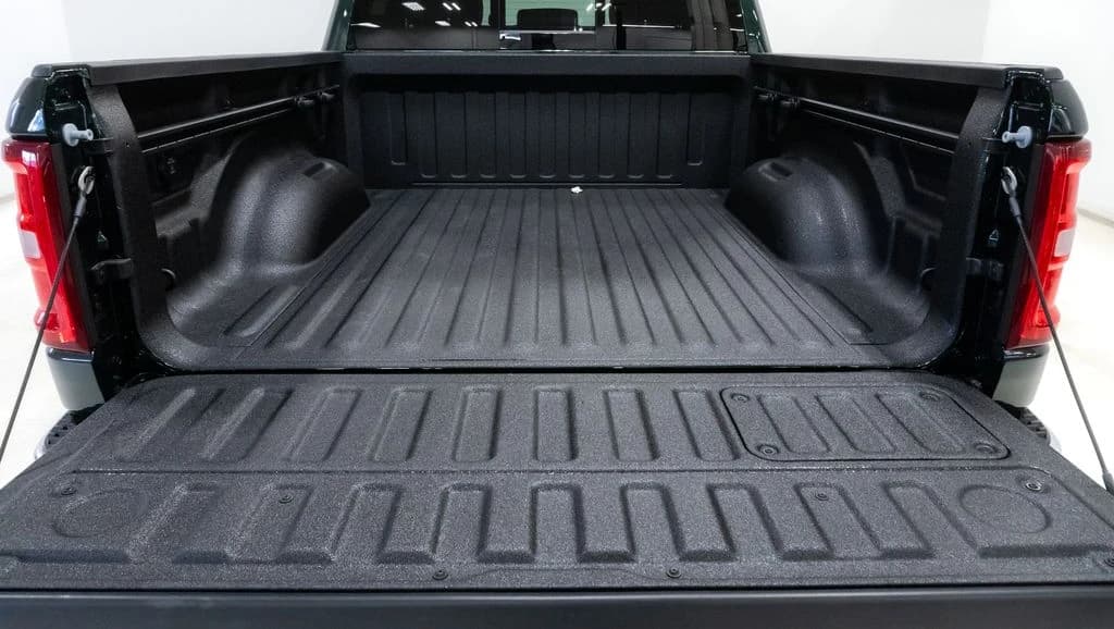 Ram 1500 Laramie 4x4 Crew Cab 5'7" Box 2026 — side view