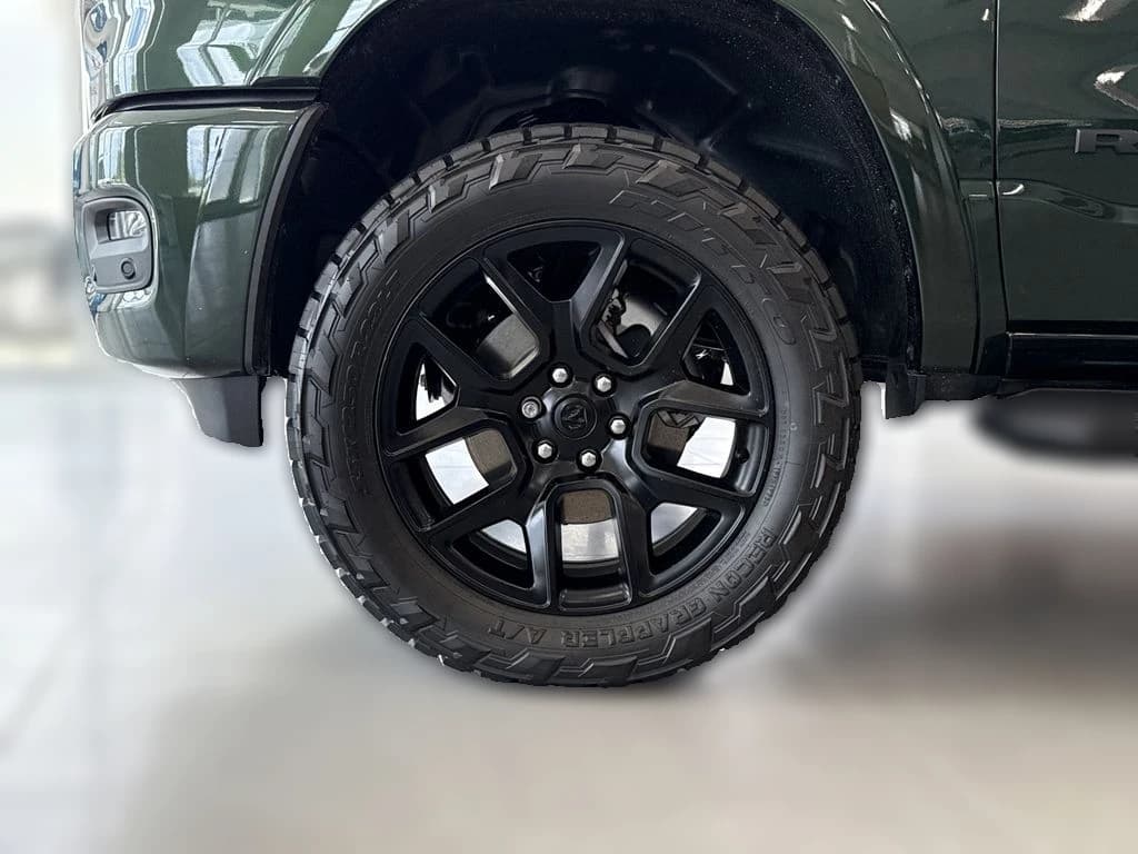 Ram 1500 Laramie 4x4 Crew Cab 5'7" Box 2026 — side view